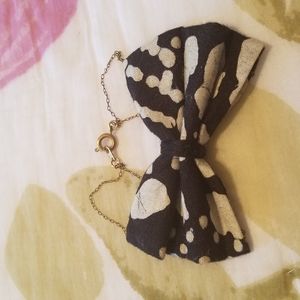 Handmade, fabric bow bracelet.